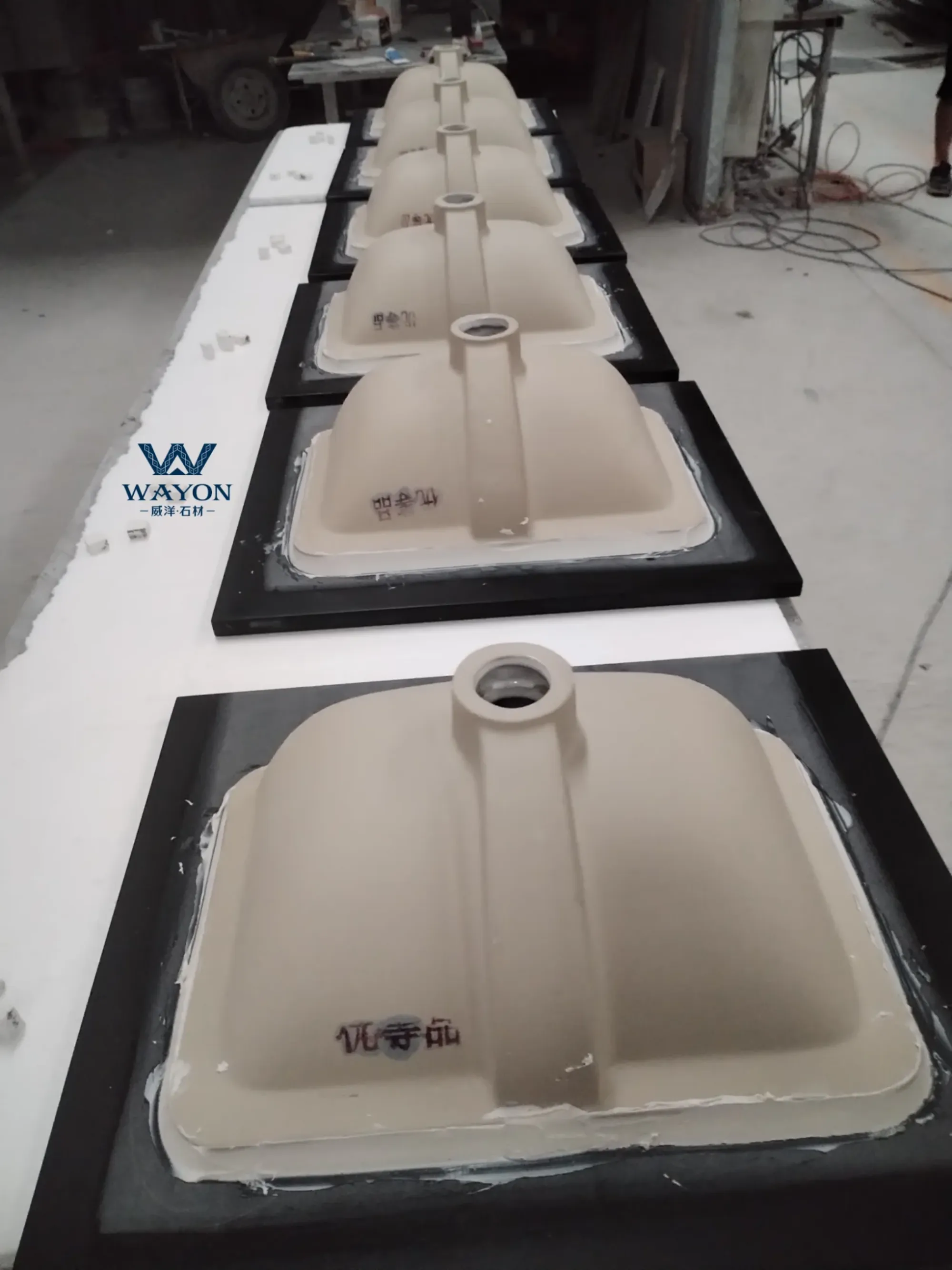 Custom solid black quartz undercounter sink